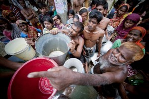 Military hand out water to people in Dhaka Bangeldesh