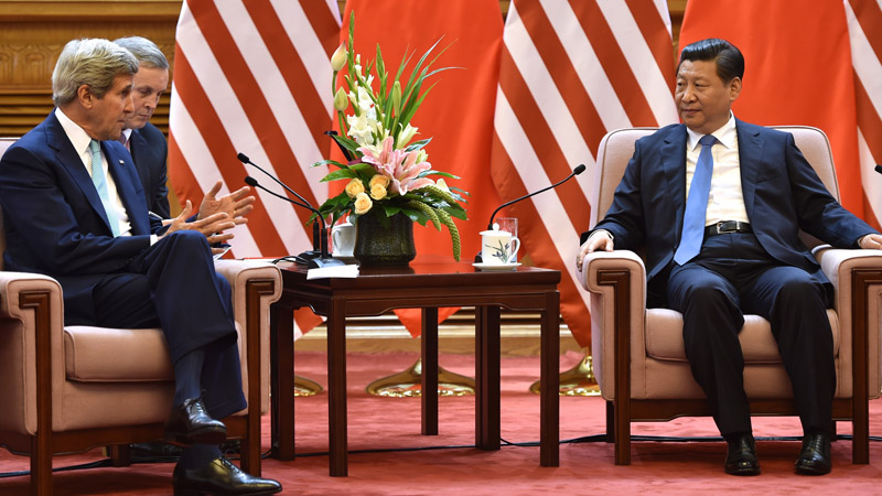 US Secretary of state John Kerry speaks to Chinese president Xi Jinping at a July meeting in Beijing (Pic: State Department/Flickr) 