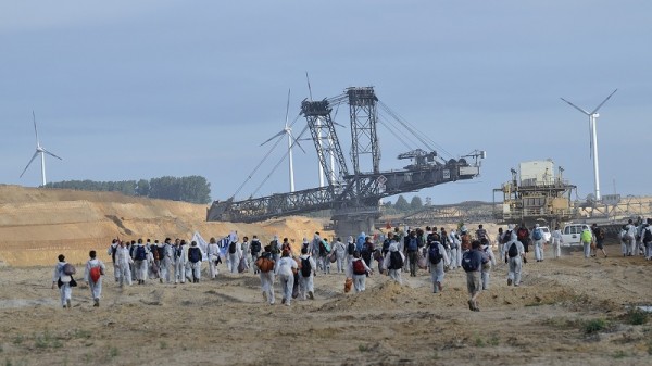 Activists walk into RWE opencast coal mine (Tim Wagner/350.org/Flickr)