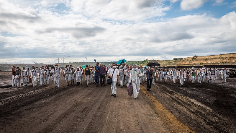 Protesters walk into RWE lignite mine, Germany (Paul Wagner/350.org/Flickr)
