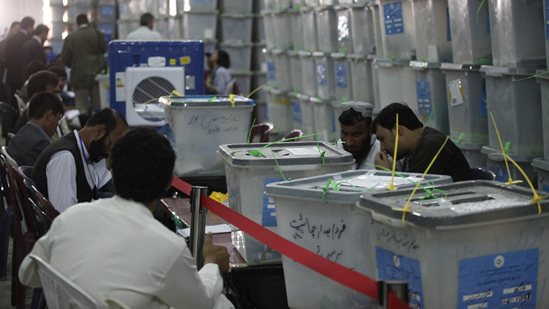 Officials audit ballot boxes in Afghanistan's 2014 election (Flickr/ UNAMA) 