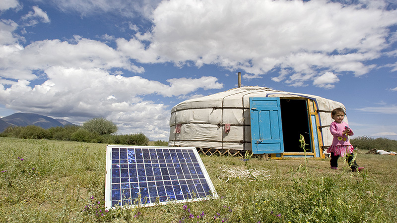 A family using solar energy in generating power in Tarialan soum, Uvs Aimag (Uvs Province). In remote soums many people live without electricity due to remoteness, vast distances and scattered nomadic way of life. These photographs depict the families working in the sea buckthorn field and shows their living conditions in a ger (Mongolian traditional tent).