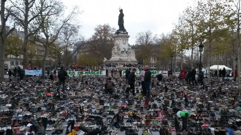 Hundreds of pairs of shoes at Place de Republique represent those people who would have marched for a climate deal before the demonstrated was cancelled (Pic: Ed King)