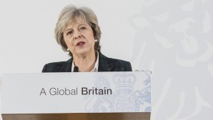 Talk climate sense to Trump, British MPs urge Theresa May