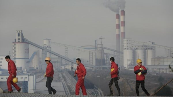 China rejects 'major emitter' label in talks to step up climate action