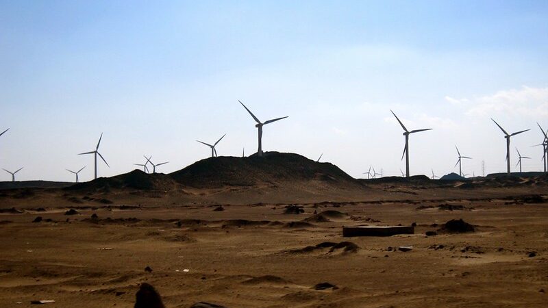 wind turbines in a desert landscape