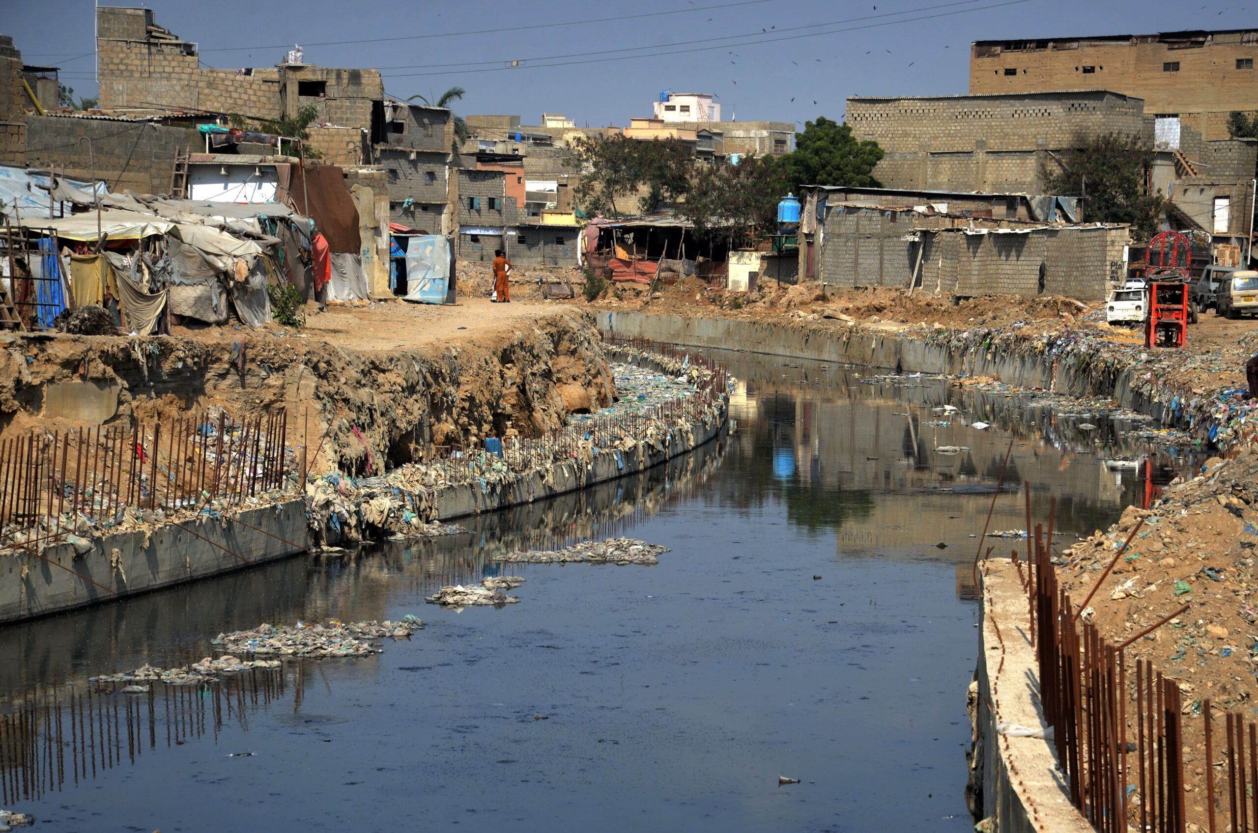 A nullah in Pakistan surrounded by informal settlements typically affected by flooding