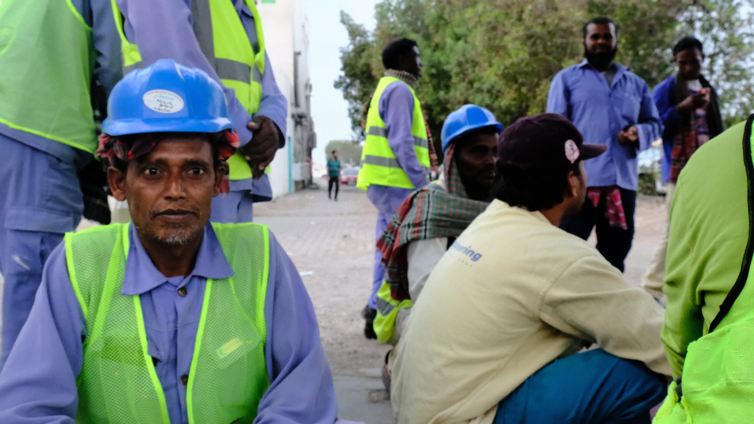 A group of migrant workers outside an oil and gas project in Abu Dhabi