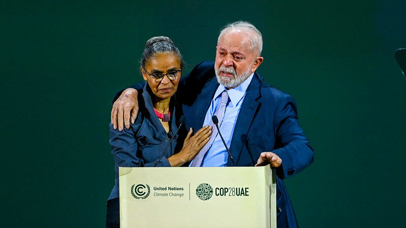 Brazil's President Lula embraces environment minister Marina Silva, with tears in his eyes