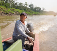 man on boat in the Amazon
