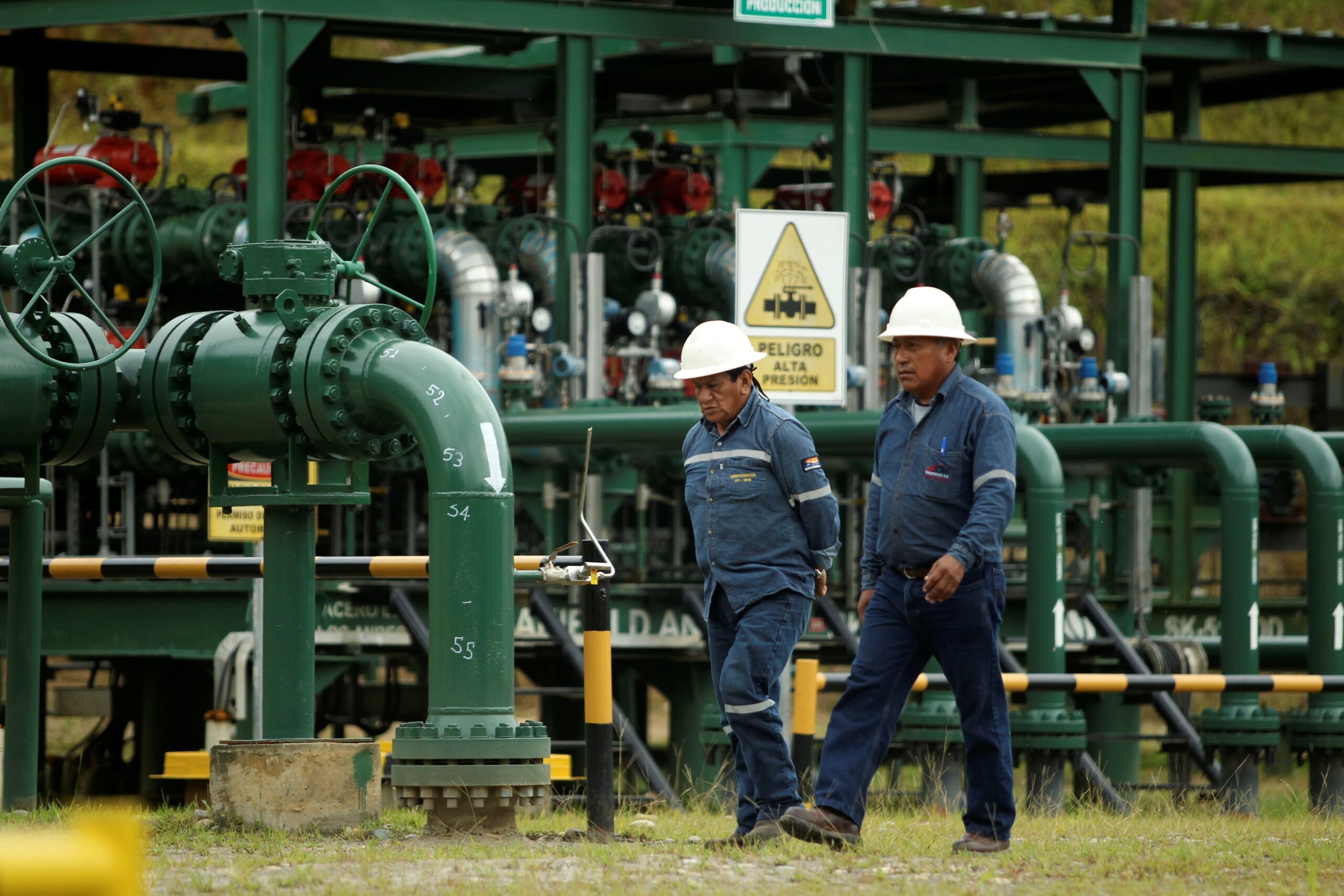 oil field technicians in Ecuador's amazon