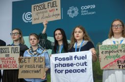 Environmental activists protest against the continued use of fossil fuels during the United Nations Climate Change Conference (COP29), in Baku, Azerbaijan November 14, 2024. REUTERS/Aziz Karimov